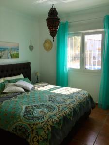 Postel nebo postele na pokoji v ubytování Villa Casira, 10 personen, Viñuela, Andalucía + 37 fotografií
