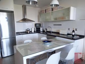 A kitchen or kitchenette at Apartamento Bella Vista - Aqua Nature La Mata