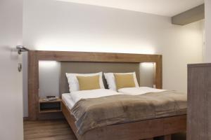 Posteľ alebo postele v izbe v ubytovaní Apartments Rainer + 37 fotografií
