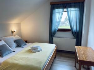 Postel nebo postele na pokoji v ubytování Guest House Family Dukić