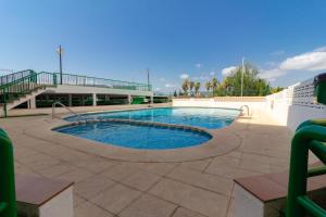 Bazén v ubytování Elegante apartamento en Playa de Gandía nebo v jeho okolí