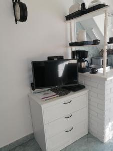 Kuchyň nebo kuchyňský kout v ubytování Gyöngyi Apartman