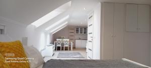 Posteľ alebo postele v izbe v ubytovaní Júlia Apartman