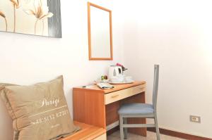 Posezení v ubytování Hotel La Perla