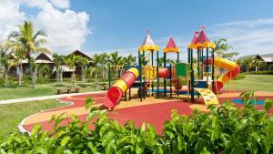 a playground with a slide in a park at Duyong Marina & Resort in Kuala Terengganu