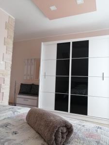Postel nebo postele na pokoji v ubytování Gyöngyi Apartman