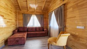 Posezení v ubytování MARTI BUNGALOW