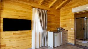 Kuchyň nebo kuchyňský kout v ubytování MARTI BUNGALOW