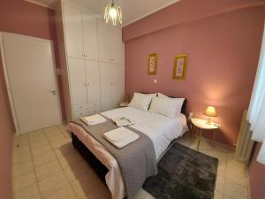 A bed or beds in a room at "Vasiliki" Home