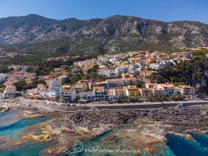 an aerial view of a town on a mountain at Casa Acqua Dolce in Cala Gonone