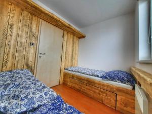 Letto o letti in una camera di Apartmán Marie