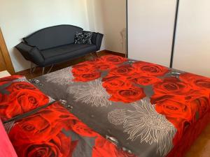 Postel nebo postele na pokoji v ubytování Bilocale Le Rose