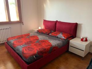 Postel nebo postele na pokoji v ubytování Bilocale Le Rose