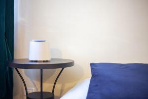 Posteľ alebo postele v izbe v ubytovaní [PISA STAZIONE - CENTRO] Appartamento Elegante con Netflix