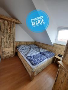 Postel nebo postele na pokoji v ubytování Apartmán Marie