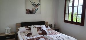 A bed or beds in a room at Ferienwohnung Rustico ai Monti