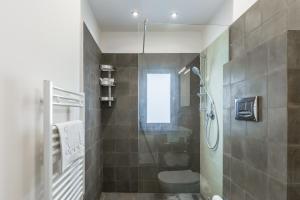 Ванна кімната в I Mori - Design Apartments