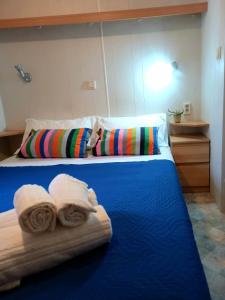 Voodi või voodid majutusasutuse Sunseabeach toas