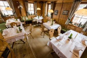 Reštaurácia alebo iné gastronomické zariadenie v ubytovaní s'Hoamatl Dorfkrug Appartements