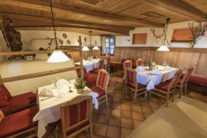 Reštaurácia alebo iné gastronomické zariadenie v ubytovaní s'Hoamatl Dorfkrug Appartements