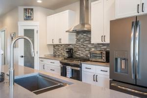 Η κουζίνα ή μικρή κουζίνα στο Fox Creek 2 townhouse