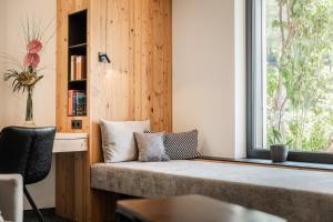 Posteľ alebo postele v izbe v ubytovaní s'Hoamatl Dorfkrug Appartements