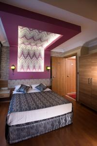 Postel nebo postele na pokoji v ubytování Şirin Hotel