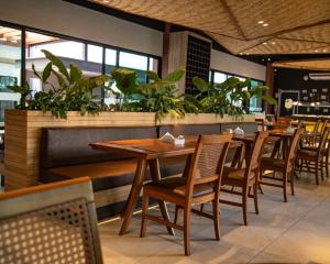 A restaurant or other place to eat at Nova Onda Hotel