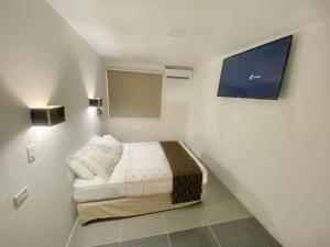 Postel nebo postele na pokoji v ubytování Hotel HSR