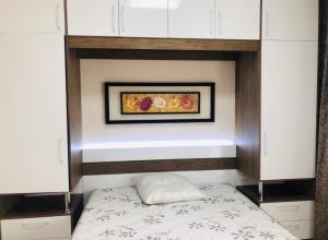 Кровать или кровати в номере РАДУГА Иссык-Куль