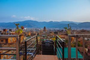 a view of a city from a balcony at Tulaja Boutique Hotel in Bhaktapur