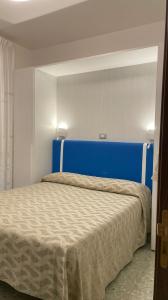 Postel nebo postele na pokoji v ubytování B&B Vittoria