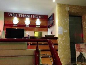 a hotel lobby with a sign that reads vetthan hotel at Viet Thanh Hotel in Ha Long