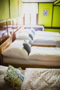 Voodi või voodid majutusasutuse Turnovská chata toas