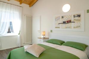 Rúm í herbergi á Albergo Ristorante Stazione Balerna