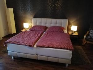 Кровать или кровати в номере Ferienwohnung Fackiner