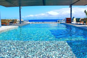 
The swimming pool at or near Singular Joy Vacation Rentals

