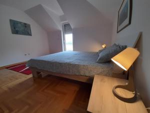 Ein Bett oder Betten in einem Zimmer der Unterkunft Jelica Apartment