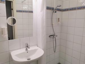 Vannituba majutusasutuses Hotel Lorensberg
