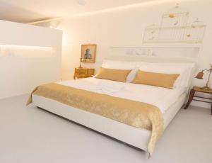 Postel nebo postele na pokoji v ubytování DelleFarfalle Boutique B&B