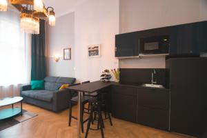 Kuchyň nebo kuchyňský kout v ubytování Stross Apartments