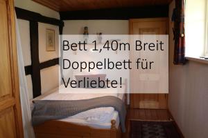 Ein Bett oder Betten in einem Zimmer der Unterkunft Appartementhotel Blomberger Hof