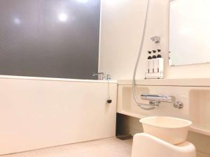 Salle de bains dans l'établissement Hotel Shin Osaka