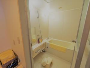 Salle de bains dans l'établissement Hotel Shin Osaka