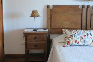 Uma cama ou camas num quarto em Amieira Agroturismo