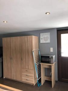 Cuisine ou kitchenette dans l'établissement A La Reid Paisible
