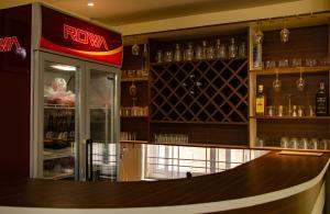 A área de bar ou lounge em Hotel Elegant