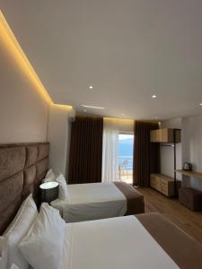 Кровать или кровати в номере Hotel Erioni