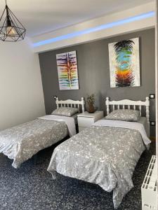 Posteľ alebo postele v izbe v ubytovaní SALOU : SPACIEUX APPARTEMENT 100 M2 vue sur mer