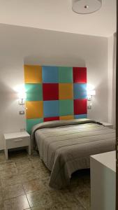 Postel nebo postele na pokoji v ubytování B&B Vittoria